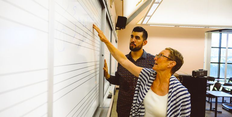Cruz Gonzalez with professor