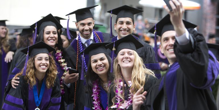 A group of graduates wearing regalia