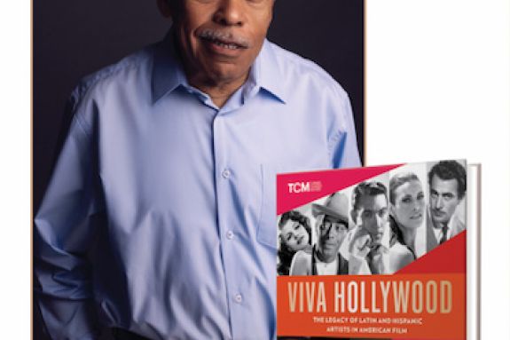 Luis Reyes with his new book, "Hispanics in Hollywood"