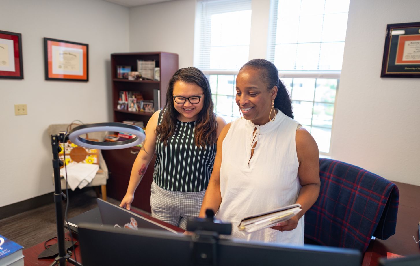 Executive Assistant May Tag Yang and Vice President for Diversity Equity and Inclusion Mary Wardell-Ghirarduzzi