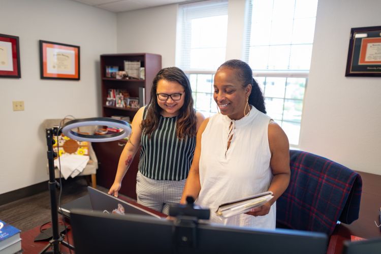 Executive Assistant May Tag Yang and Vice President for Diversity Equity and Inclusion Mary Wardell-Ghirarduzzi