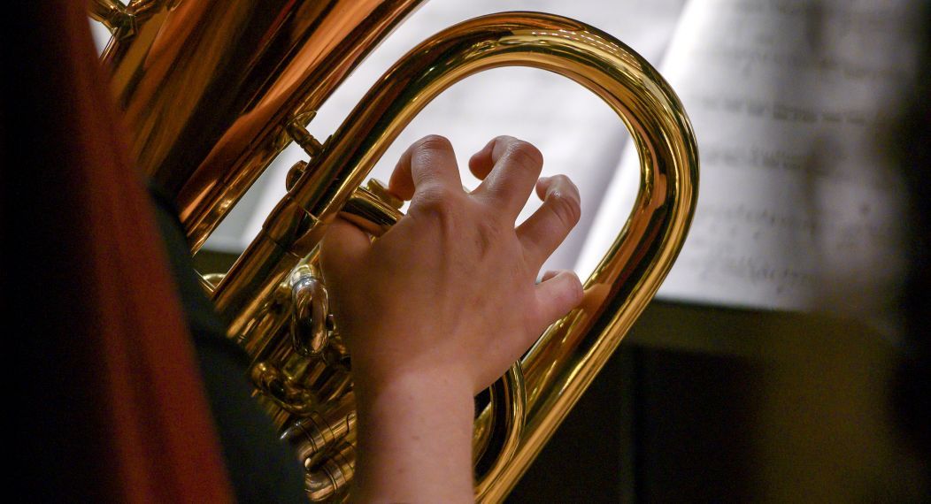 Student playing a euphonium